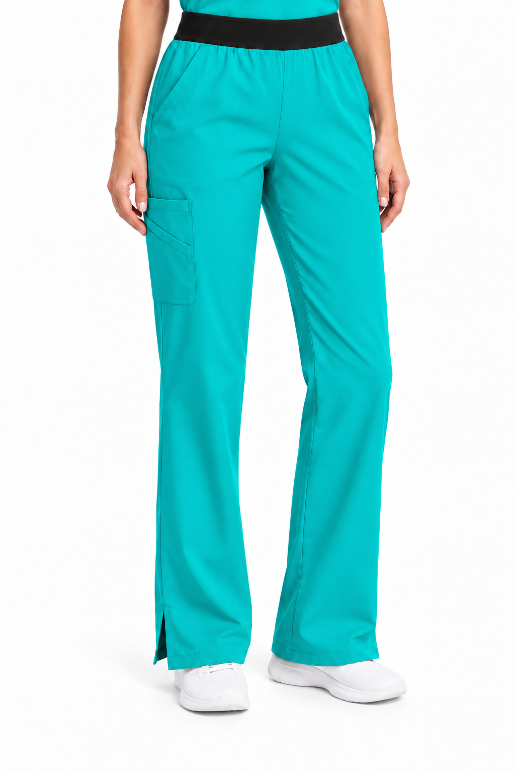 A person wearing bright turquoise scrub pants with a black elastic waistband and white sneakers, shown from the waist down on a plain white studio background.