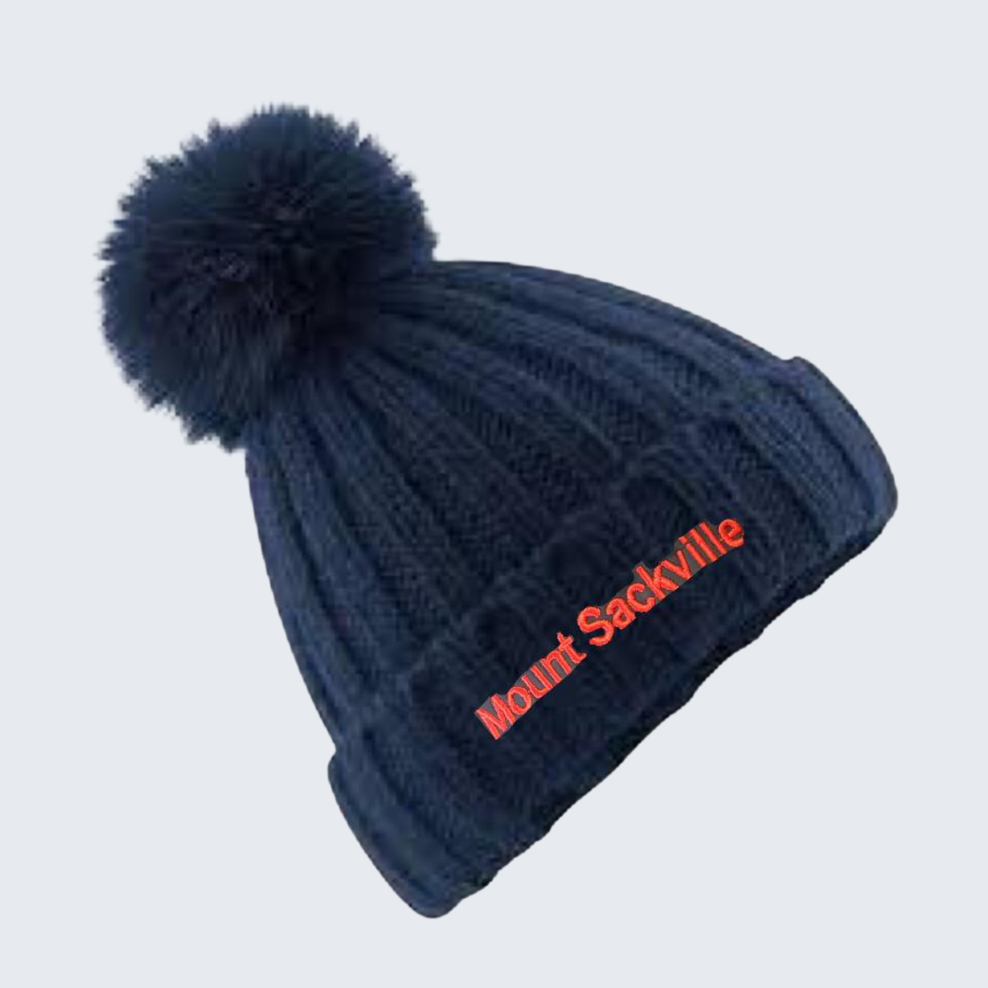 Navy blue beanie with pom-pom and 'Mount Sackville' text on a light gray background