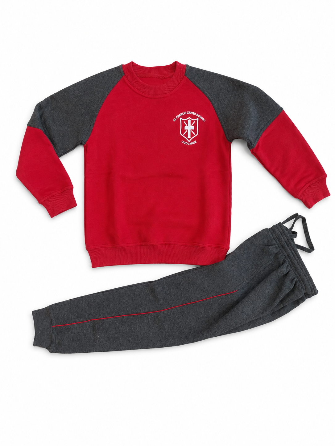A two-piece kids' sweatshirt and jogger set laid flat on a white background. The sweatshirt has red raglan sleeves and body with dark gray sleeves, featuring a white crest logo on the left chest.