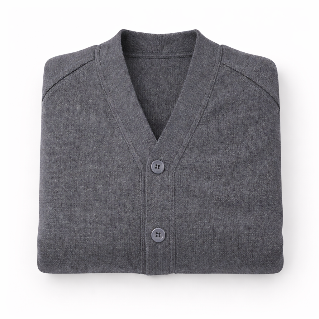 Folded gray cardigan on a white background
