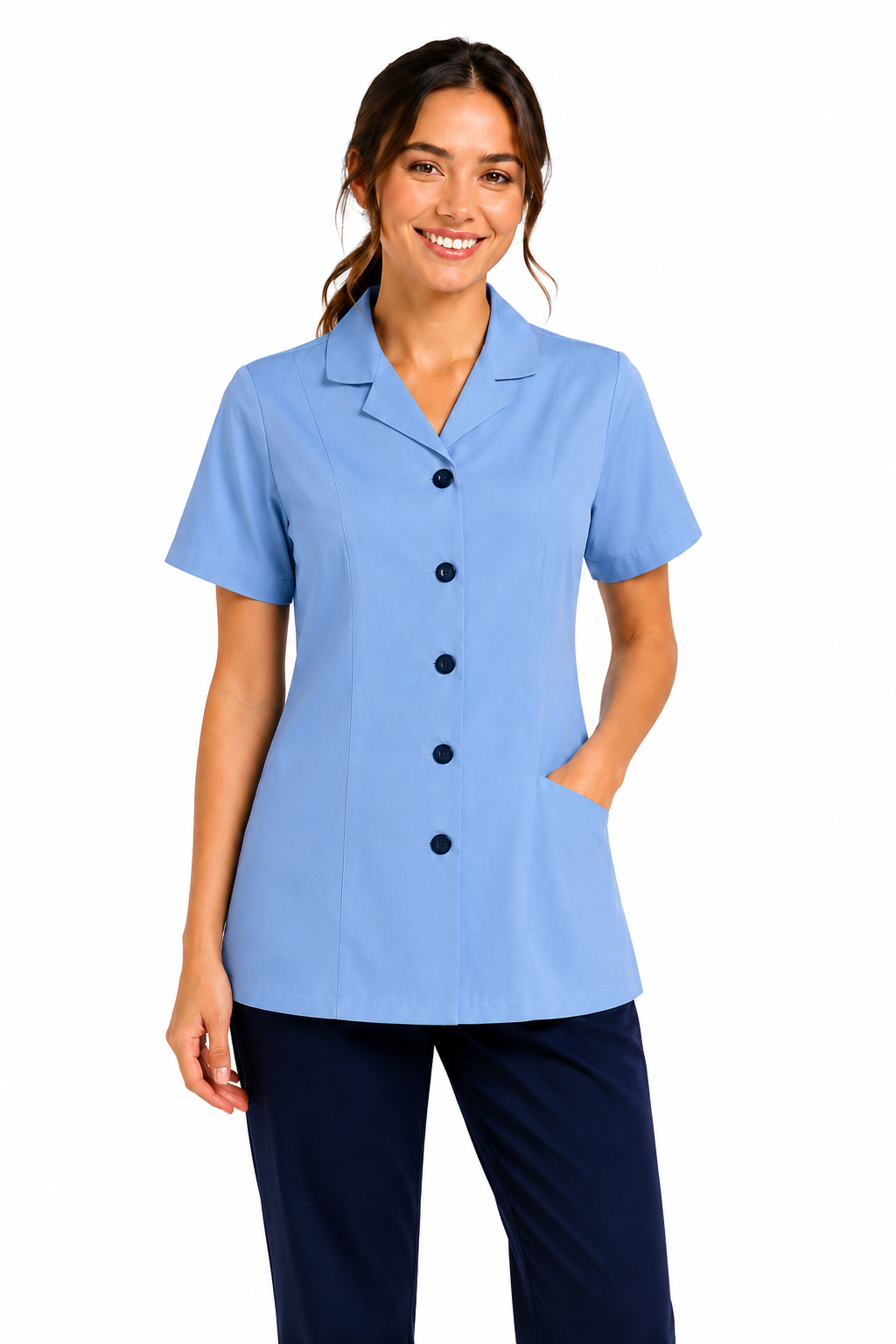 Woman wearing a light blue scrub top with black buttons on a white background